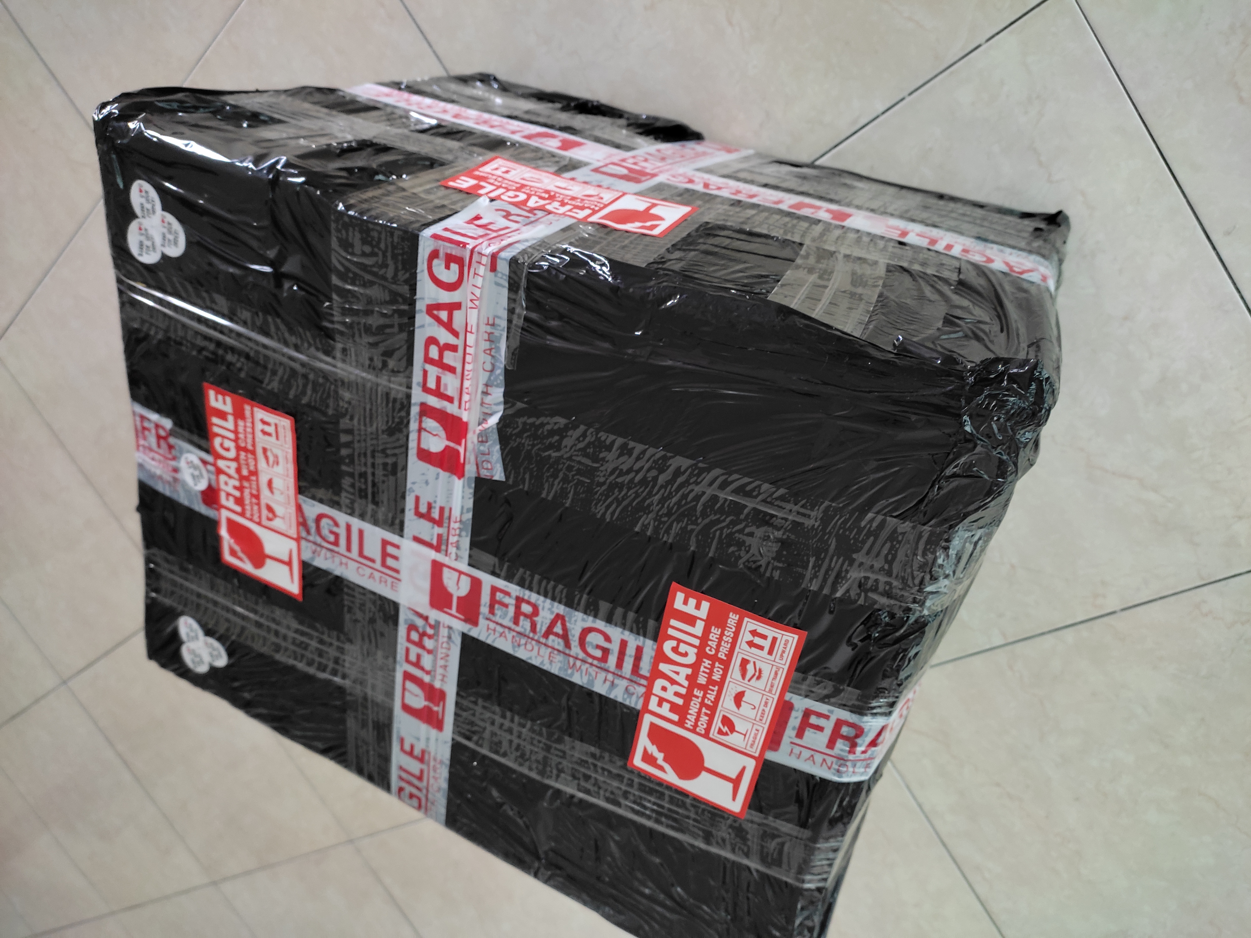 Secure packaging step 3 for liquor delivery in Malaysia